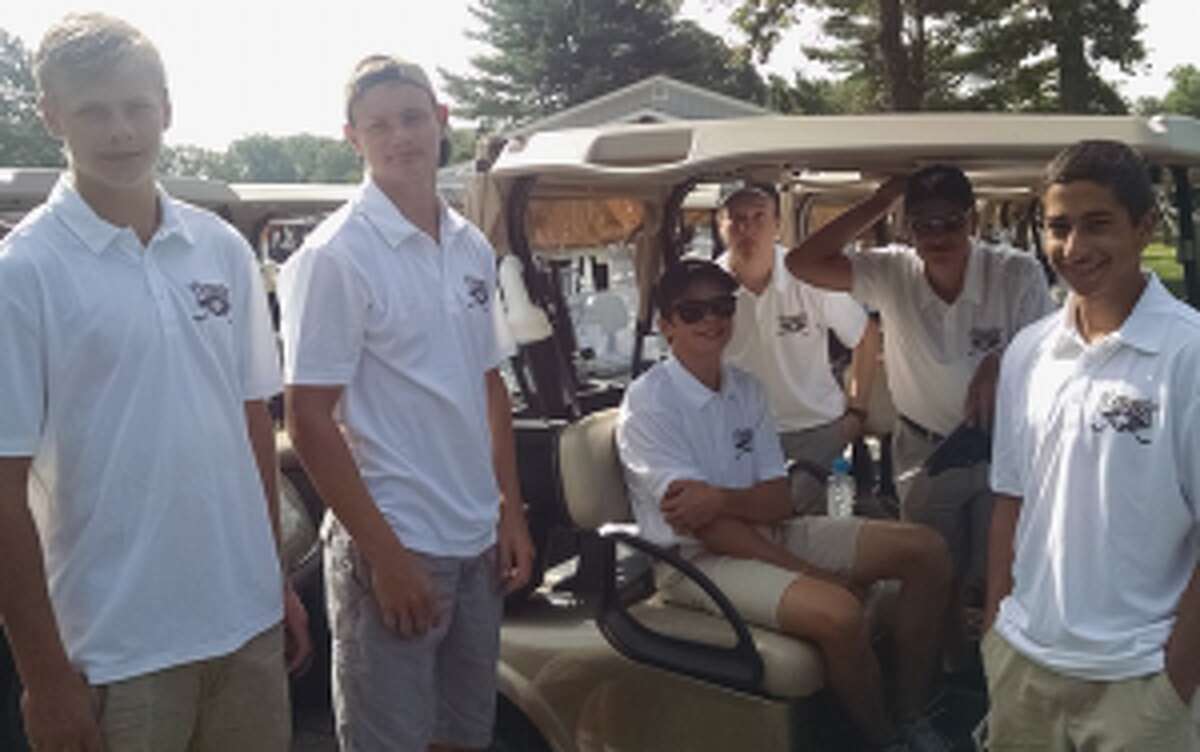Trumbull High hockey players at the First Selectman's Golf Classic.