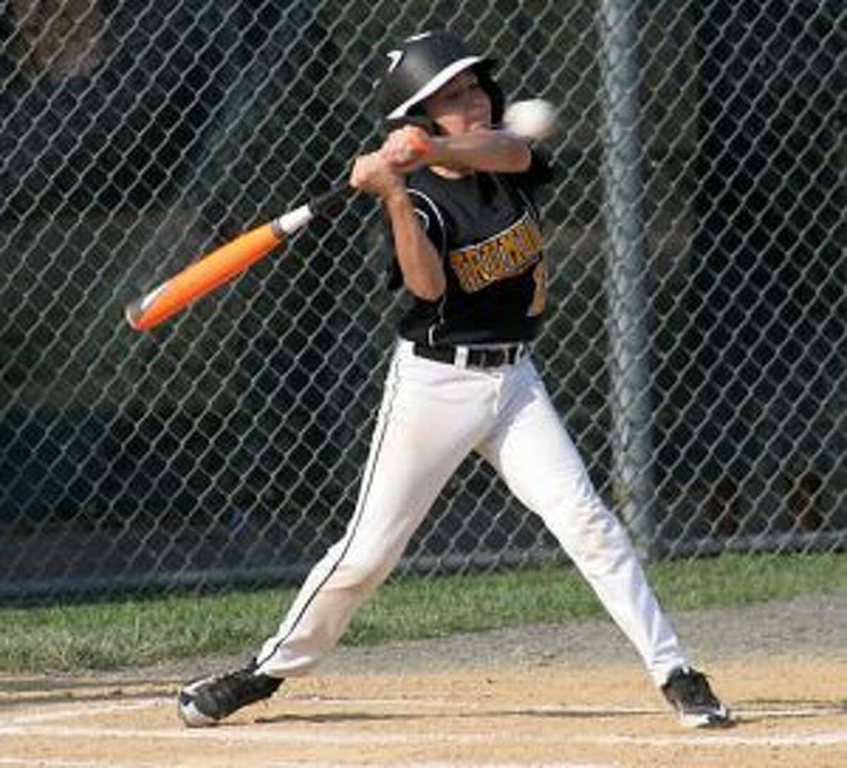 Trumbull's Erik Osterberg checks his swing leading off the home first.