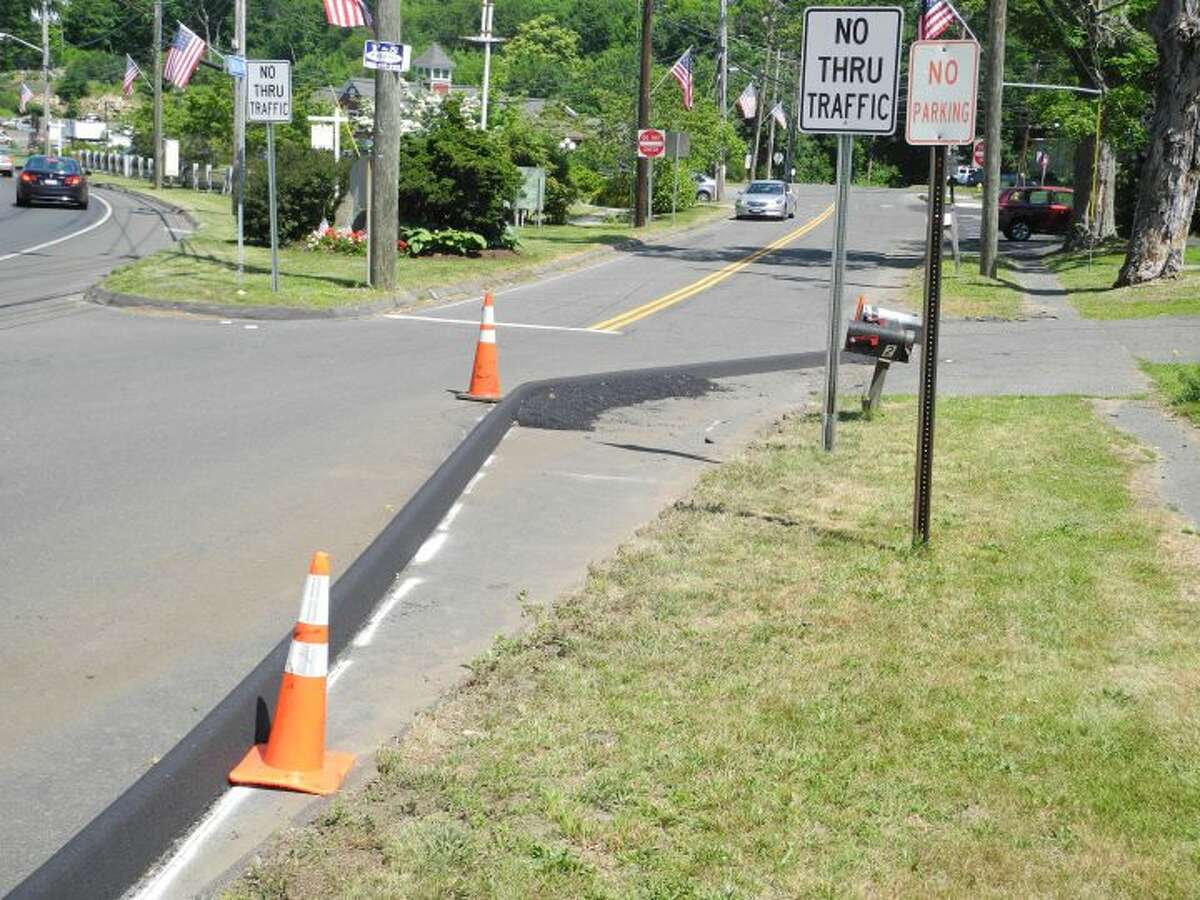 While it's a big deal today, the Broadway curb might not be a long-term problem for Trumbull drivers. — Steve Coulter photo