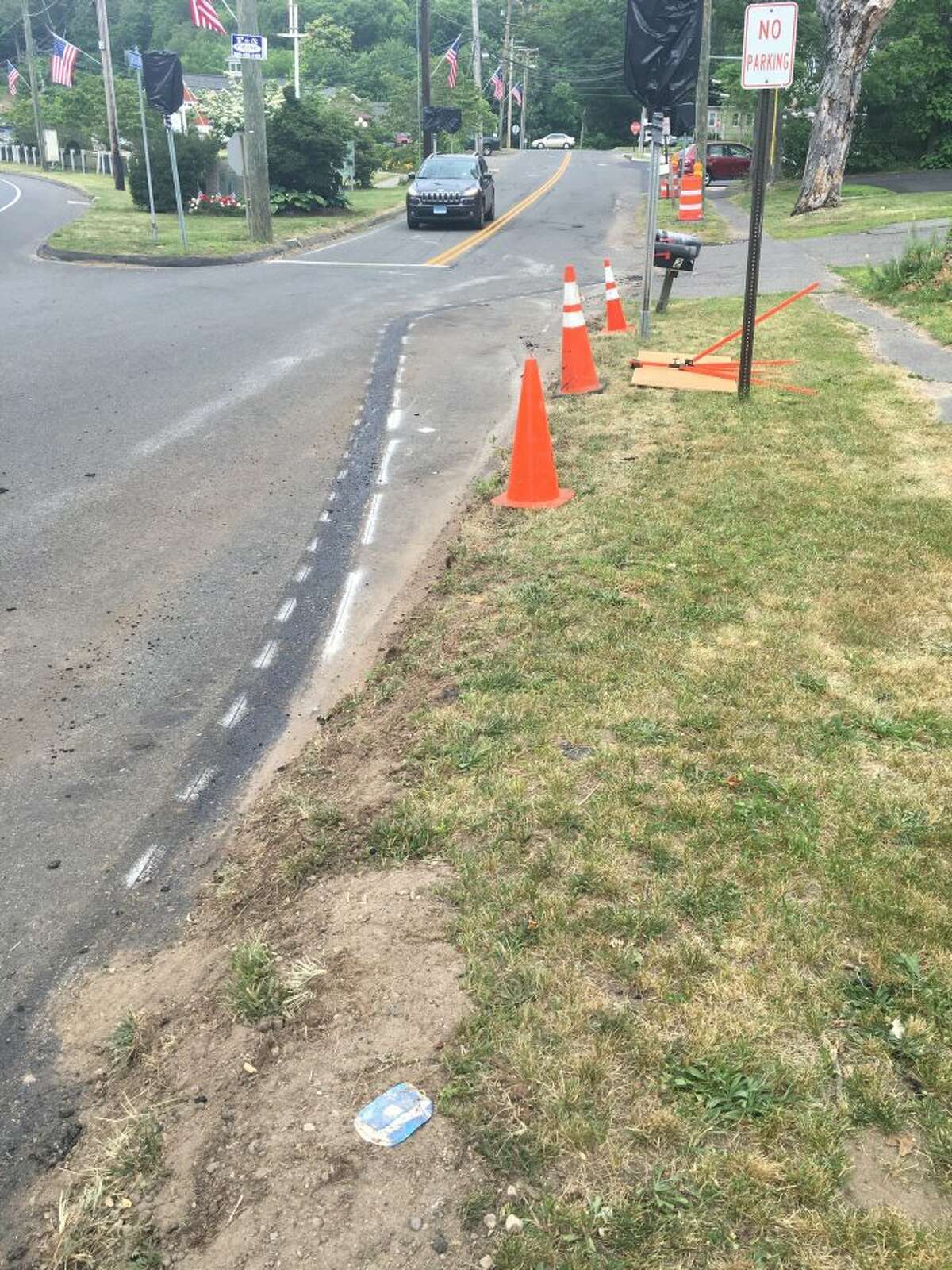The Broadway Road curb that was installed earlier week was removed Thursday, June 23. — Steve Coulter photo