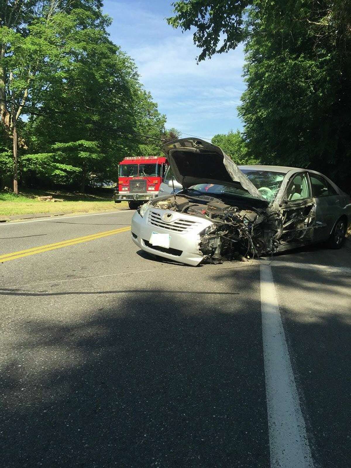Monroe fire crews helped extricate one driver following a serious two-car collision on Elm Street Monday, June 18.