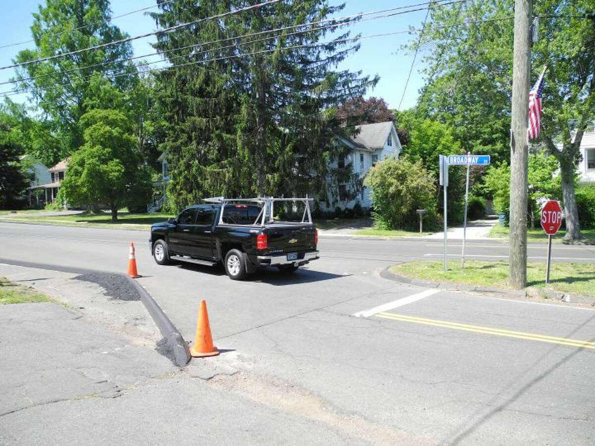 The intersection of Main Street and Broadway Road has become dangerous for Trumbull vehicles, like the black truck pictured above, this week. — Steve Coulter photo