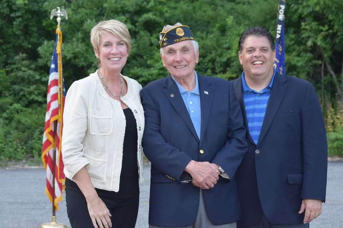 State Rep. Laura Devlin, with Post Commander George Areson and State Rep. David Rutigliano honoring Flag Day.