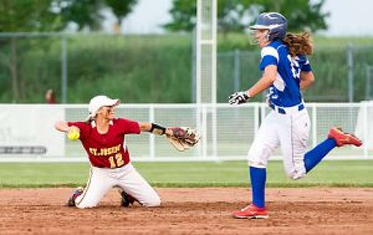 Hanna Errico throws out a Rocky Hill runner in the top of the sixth inning. — David G. Whitham photo