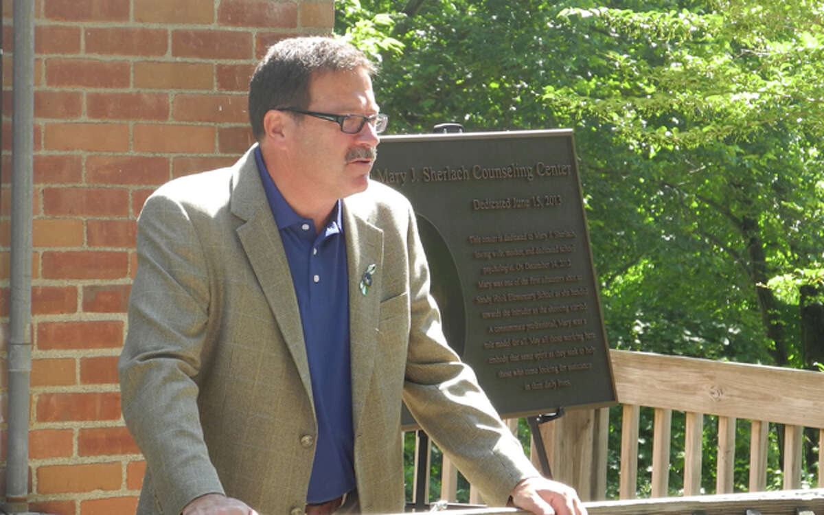 Trumbull resident Bill Sherlach, Mary's husband speaks at the dedication of the center last June.