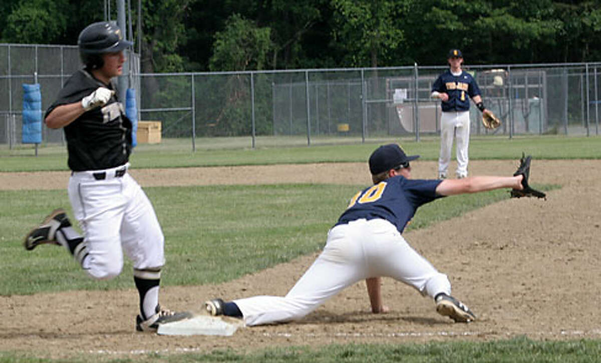 Trumbull High's Alex Rauso beats the throw from right field on his sharp single in the fourth inning. — Bill Bloxsom photo