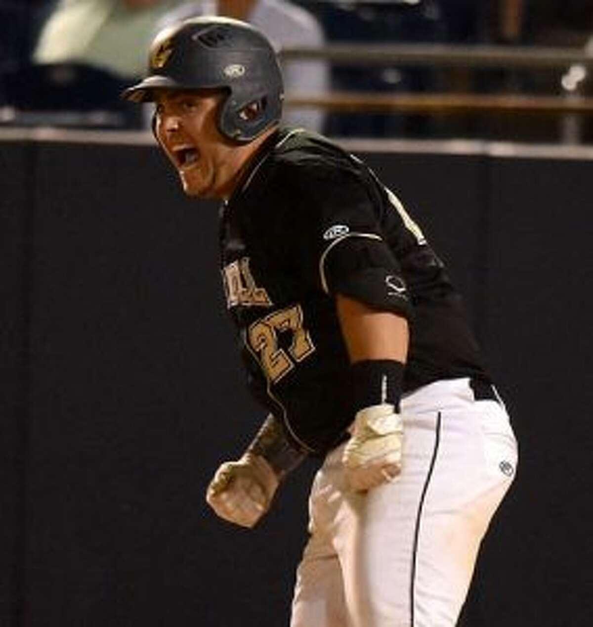 Kris DiCocco reacts after driving in the go-ahead run for Trumbull in the eighth inning. — Dave Stewart photos