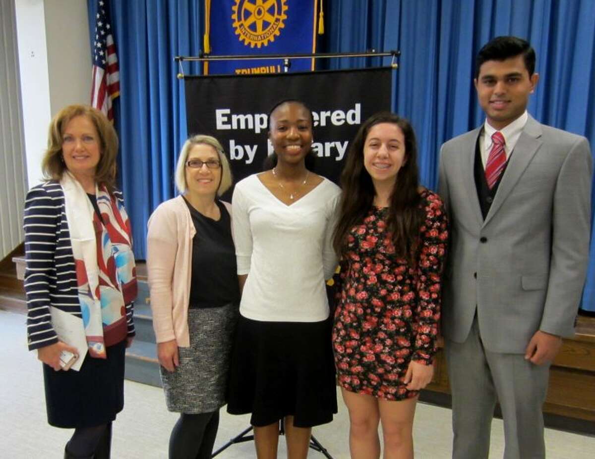Deborah Cox, left, president of the Trumbull Rotary Club, stands with Trumbull High School debate team coach Hope Spalla and her students Danielle Cross, Julia Esposito and Anush Sureshbabu. Danielle won first place at the Rotary’s annual four-way test speech contest with Julia and Anush finishing second and third, respectively.