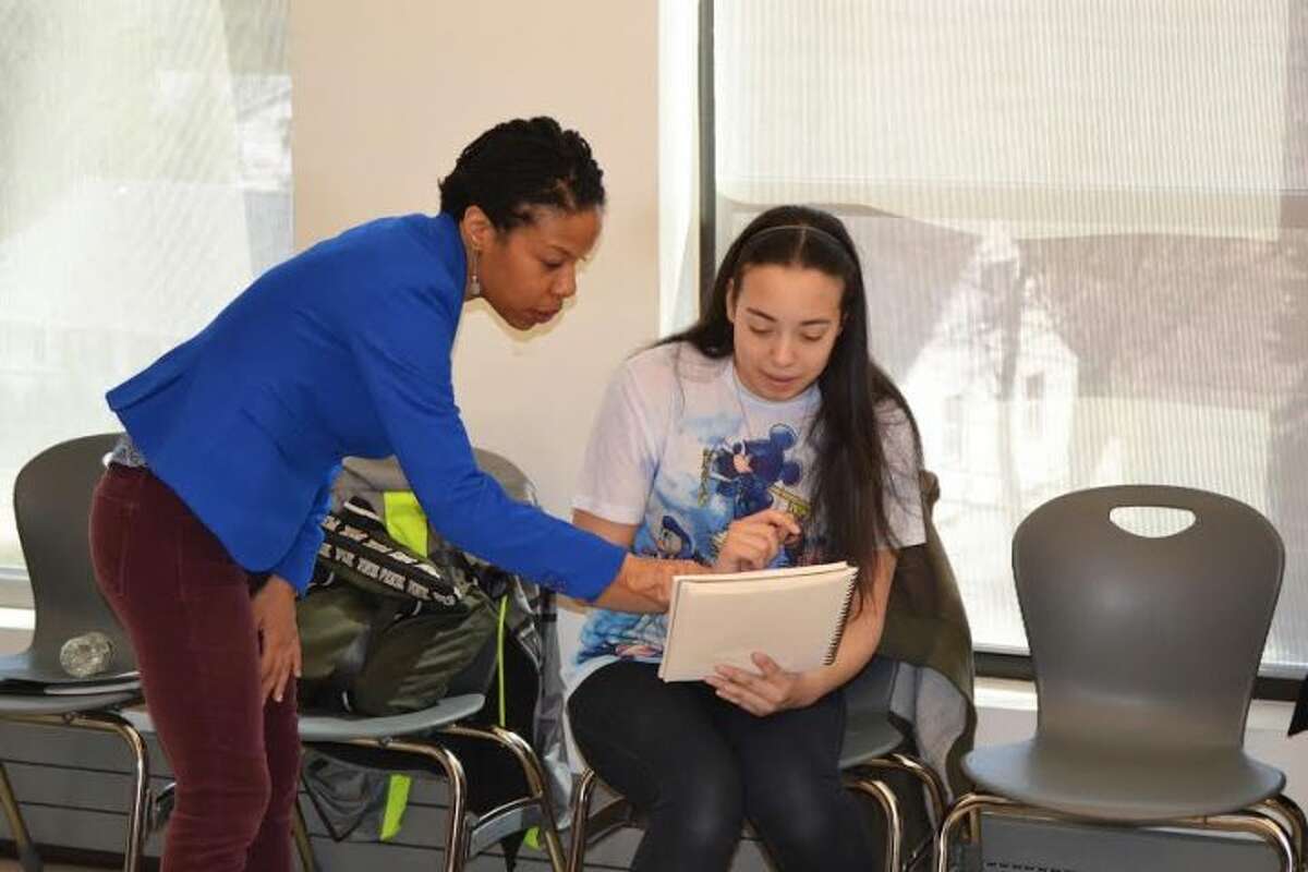 Nilaja Sun teaches a student from the Regional Center for the Arts.