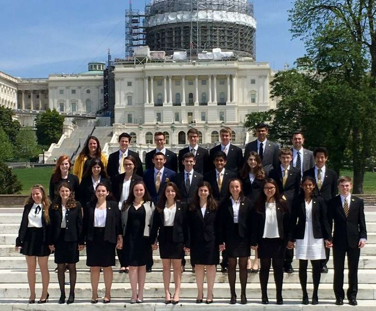 Trumbull High School's We the People team poses outside the Capitol Monday, April 24.