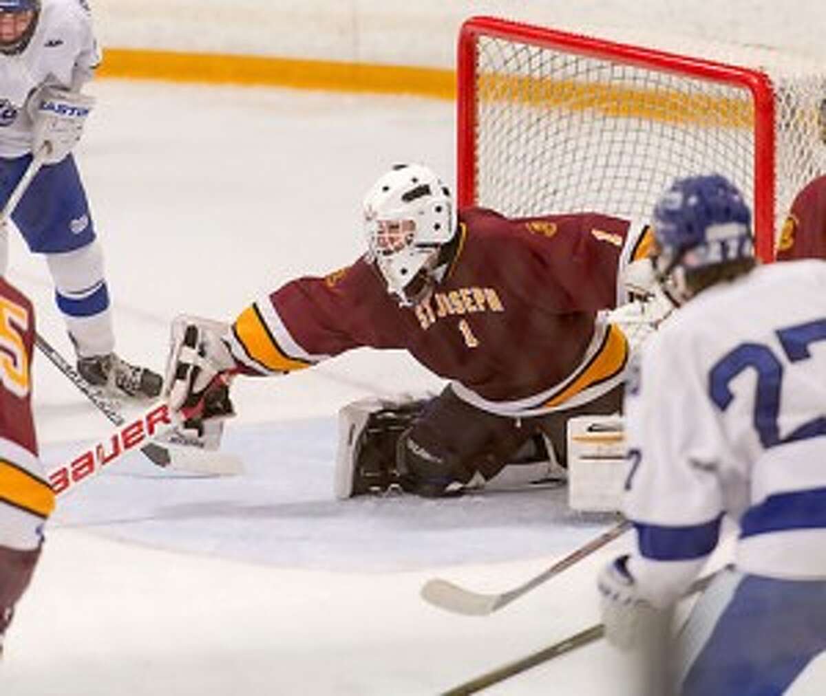 Ryan Wilson looks to defend Darien in the Division I quarterfinals. — David G. Whitham photo