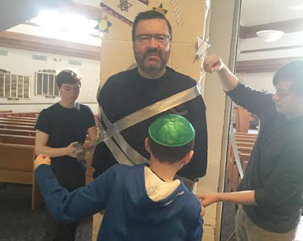 Rabbi Colin Brodie duct taped for good cause