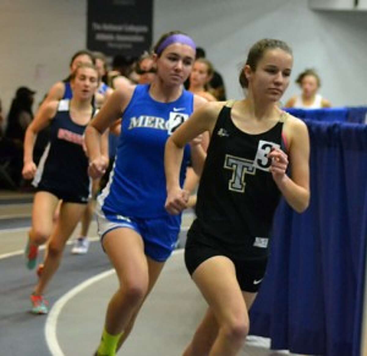 Kate Romanchick leads the way in the 3000 meter run at the Wintergreen Invitational.