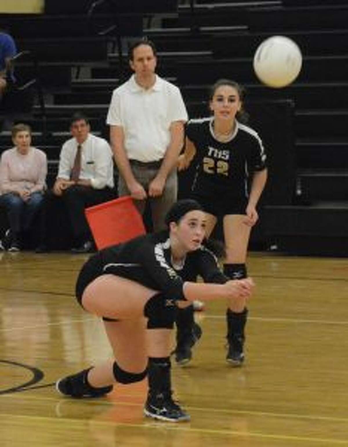 Rachel Hage makes the pass as Jess Gibbs looks on.