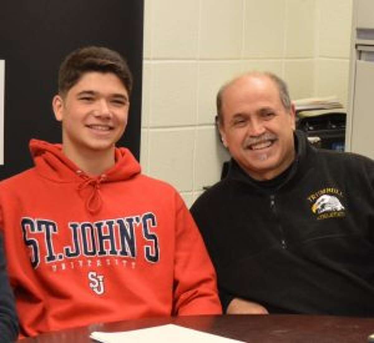 Sebastian Gangemi joins Trumbull High standout Chris Lancia at his signing to play at St. John's.