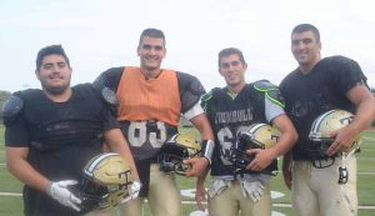 Odai Dayoub, Colton Nicholas, Adam Tolk and Eric Palinkas are Trumbull High captains. — Andy Hutchison photo