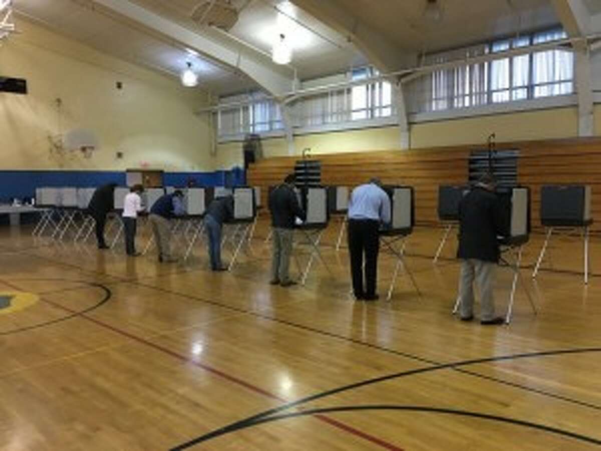 Voters cast their ballots at Madison Middle School, which is where District 3 votes.