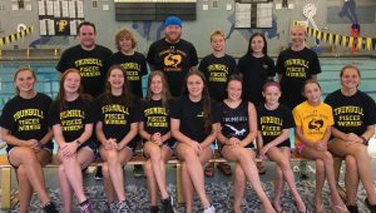 Trumbull Pisces has qualified 12 swimmers for the Age Group Championships. Pictured (front row) are: coach Amanda Daigle, Claire Kehley, Liz Stoelzel, Jacqueline Dale, Anna Haydostian, Kristen Racicot, Keira Redgate, Sarah Johnson, and coach Jessica Daigle; (second row) coach Chris Fracker, Cameron Kosak, coach Bill Strickland, Alexander Ivanovich, Norah Hampford and coach Colleen Carroll. Missing from photo are Rohit Gunda and Nicholas Paolella.
