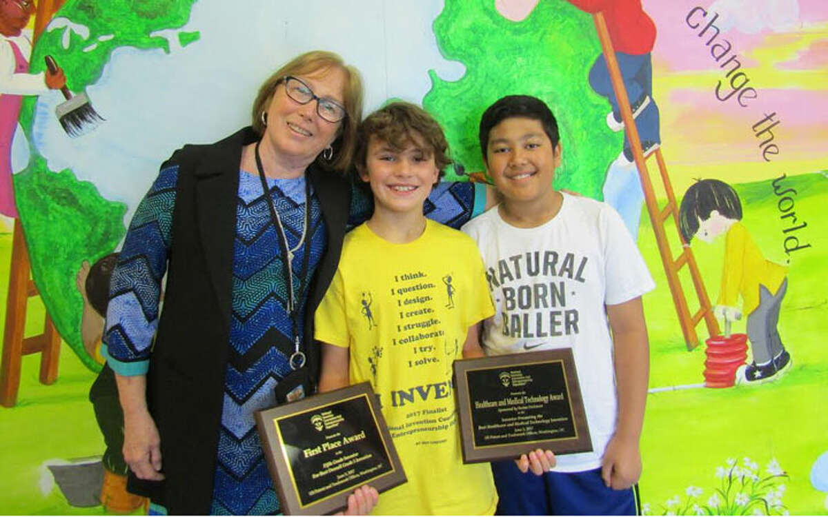 Pictured with Middlebrook School Principal Patricia Frillici are 5th graders Logan Jones and Alex Browne.