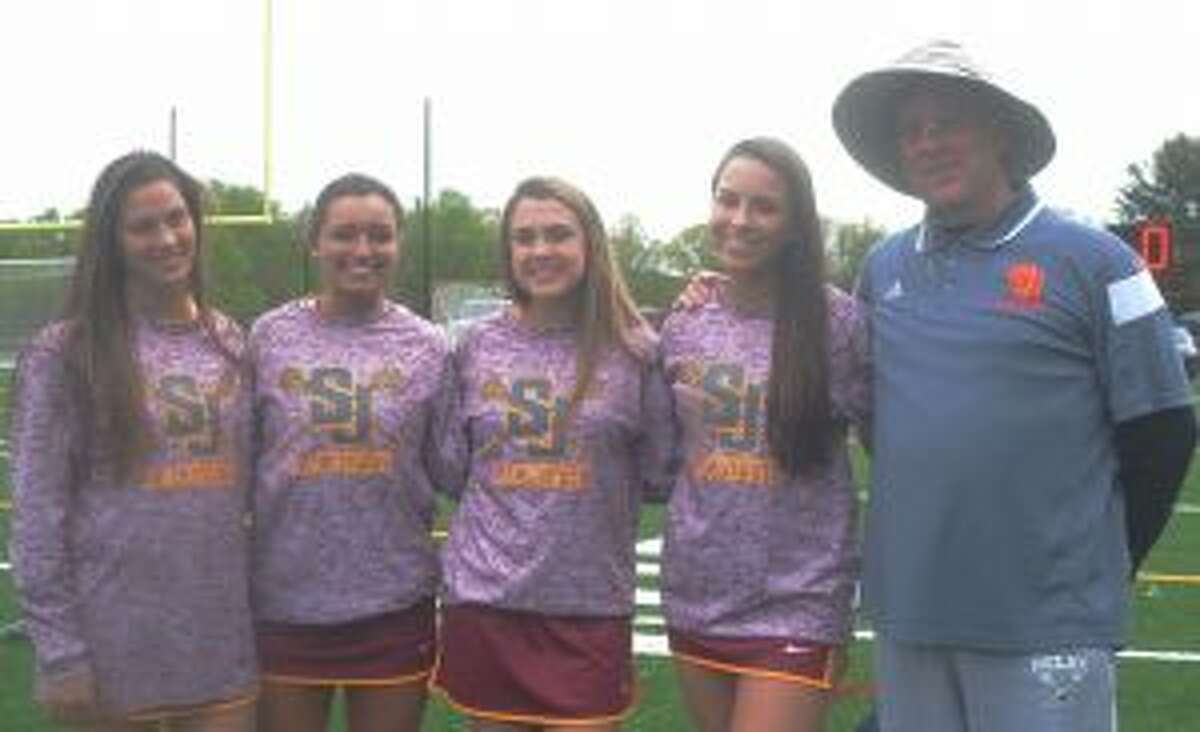 St. Joseph girls lacrosse coach Leeland Gray is joined by daughter and Cadet sophomore Jettke Gray along with seniors Mikala Trafecante, Amanda Lopez and Kate O'Dea.