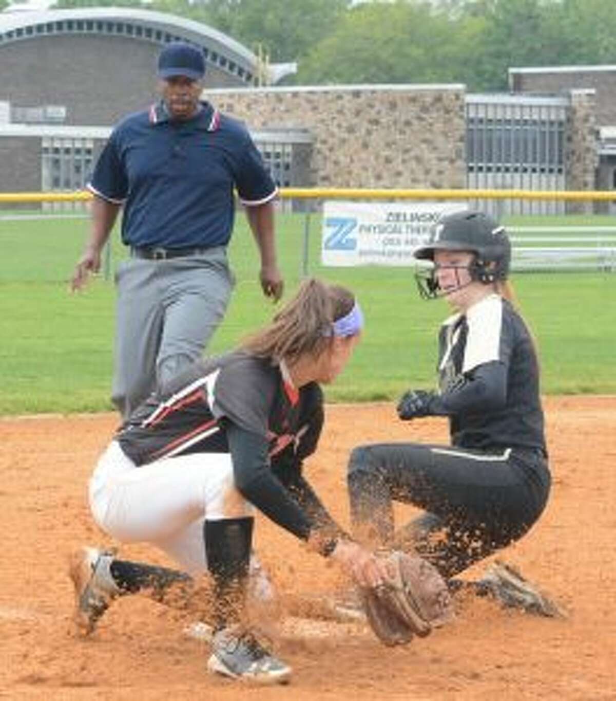 Taylor Brown slides safely into third base. - Andy Hutchison photo