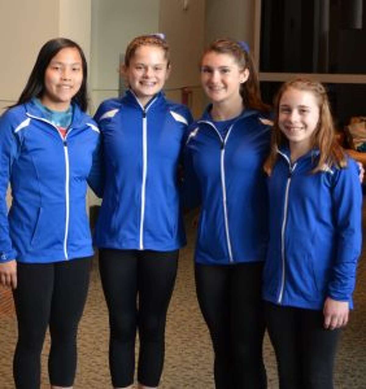 Next Dimension Gymnasts of Trumbull had four state gymnasts qualify to represent Connecticut at the Regional Championships — Samantha Markland, Macarthy Keane, Merritt Stevenson and Caitlin Vozzella.