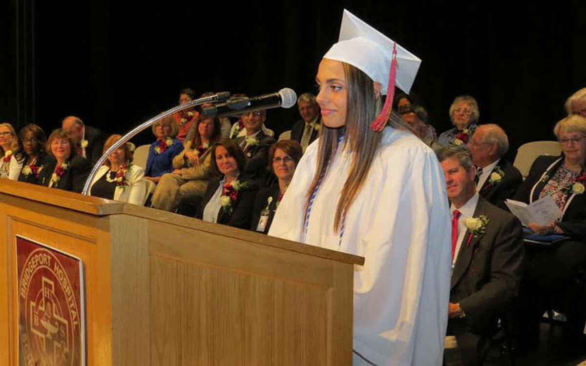 Angela Miano of Trumbull, whose grade point average topped the accelerated class, delivered a message from graduates at the commencement ceremony. Lisa Eldridge, also from Trumbull, had the second highest GPA in the accelerated class.