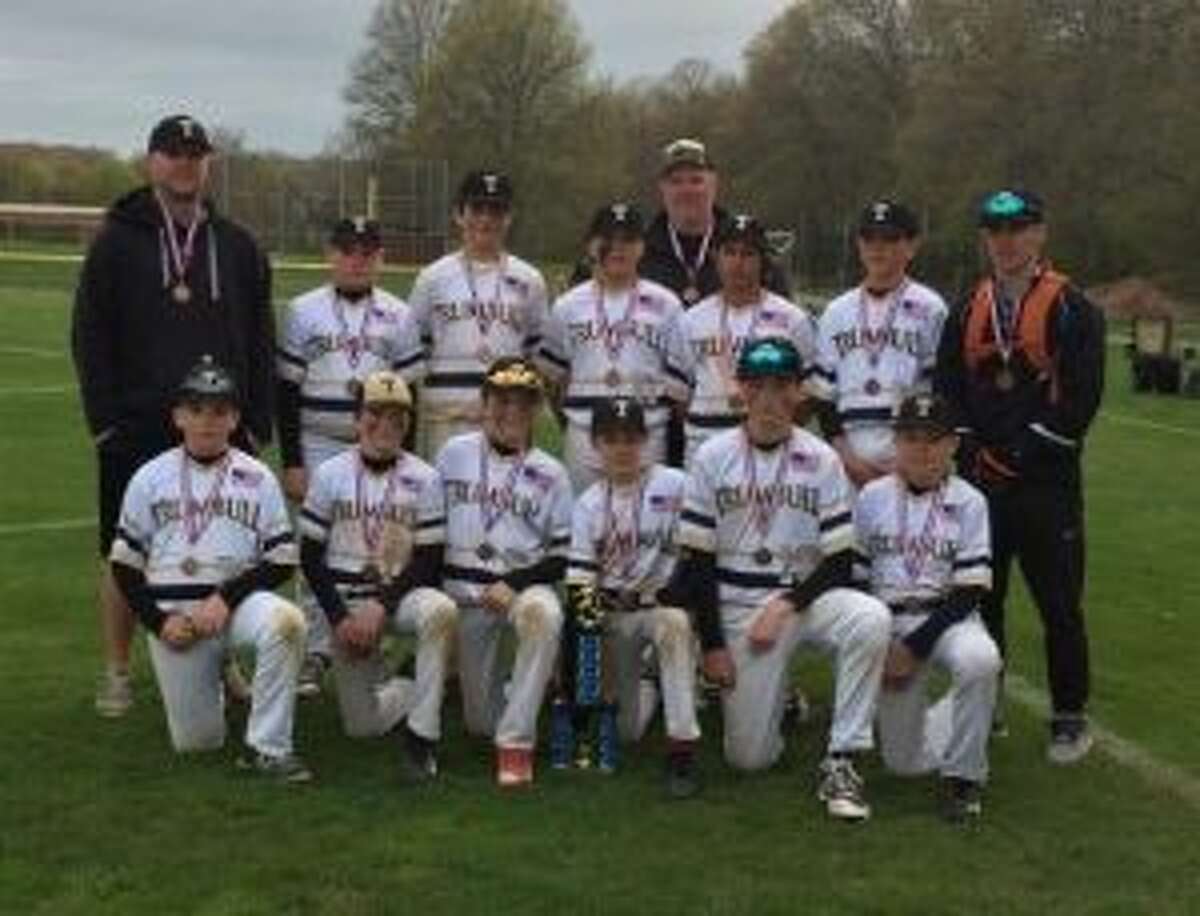 Team members (front row) are: Matt Cummings, Ray Vicente, Michael Bagley Aidan Copeland, Connor Johnston and Colin Csizmadia; (second row) assistant coach Garrie Krueger, Ryen Duffy, Timmy Pearson, Jack Arcamone, Kevin Katragadda, Logan Huzi and head coach Jeff John; (third row) assistant coach Bob Buswell.