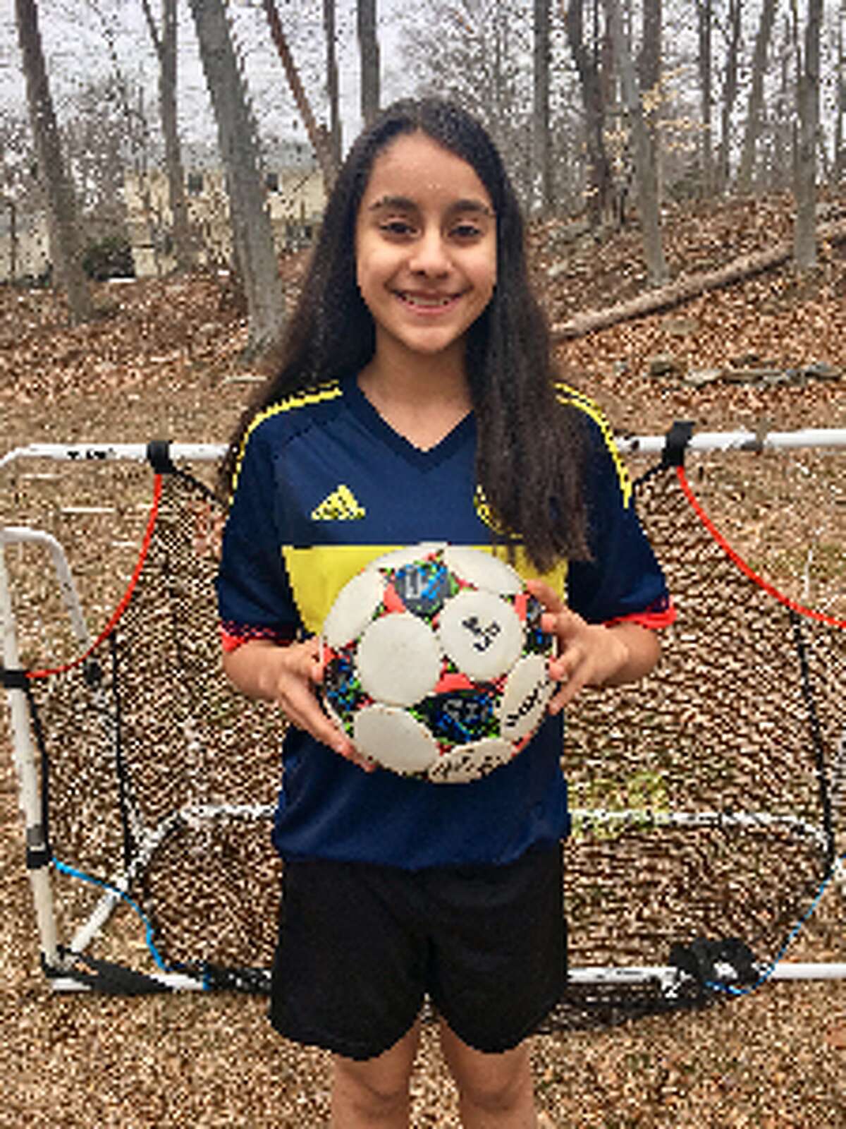 Mishka Kapoor, an eighth grade student at Madison Middle School, is hosting a "Kick for Kindness" fundraiser Sunday at the Madison Middle School soccer fields.