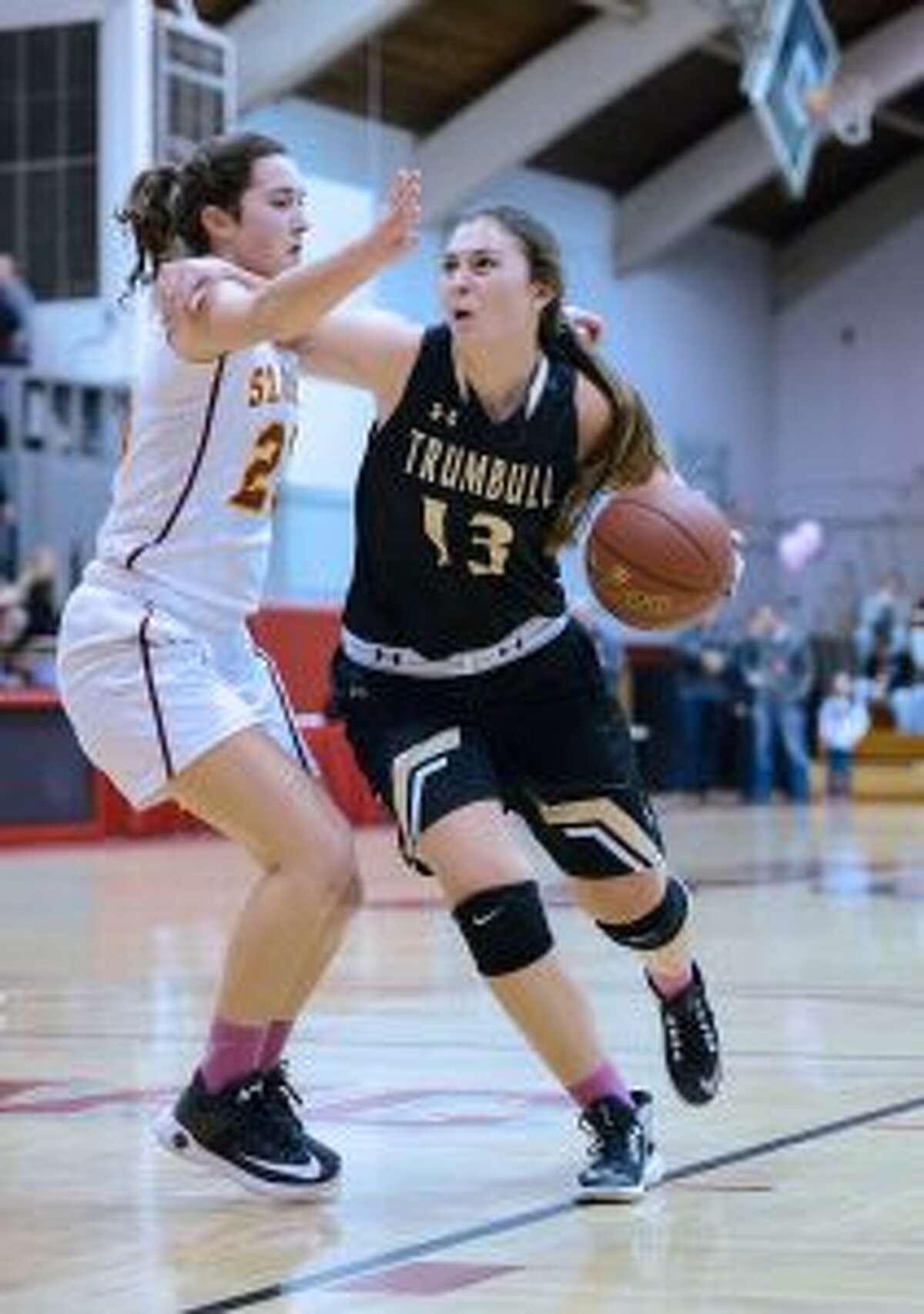 Trumbull's Claudia Tucci (13) scored 25 points in the win over Wilton. — David G. Whitham photo
