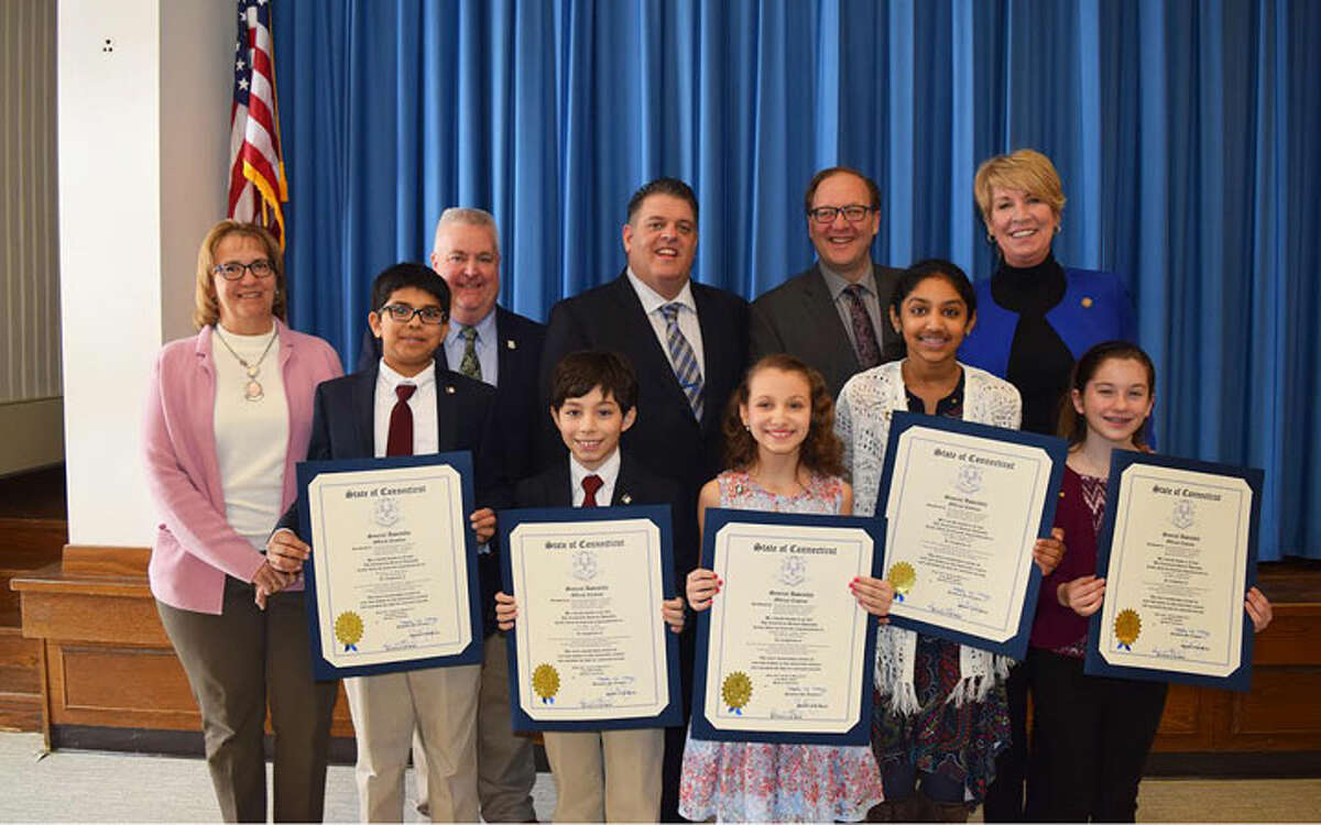 Pictured: Back row, chair of the Trumbull Board of Education Loretta Chory, Rep. Ben McGorty (R-122), Rep. David Rutigliano (R-123), Paul Lavoie, a member of the Trumbull Board of Education and Rep. Laura Devlin (R-134). Front row, Paul James, Enzo Maia, Magdalena Seres, Reshma Kode, Lizzie Steeves.