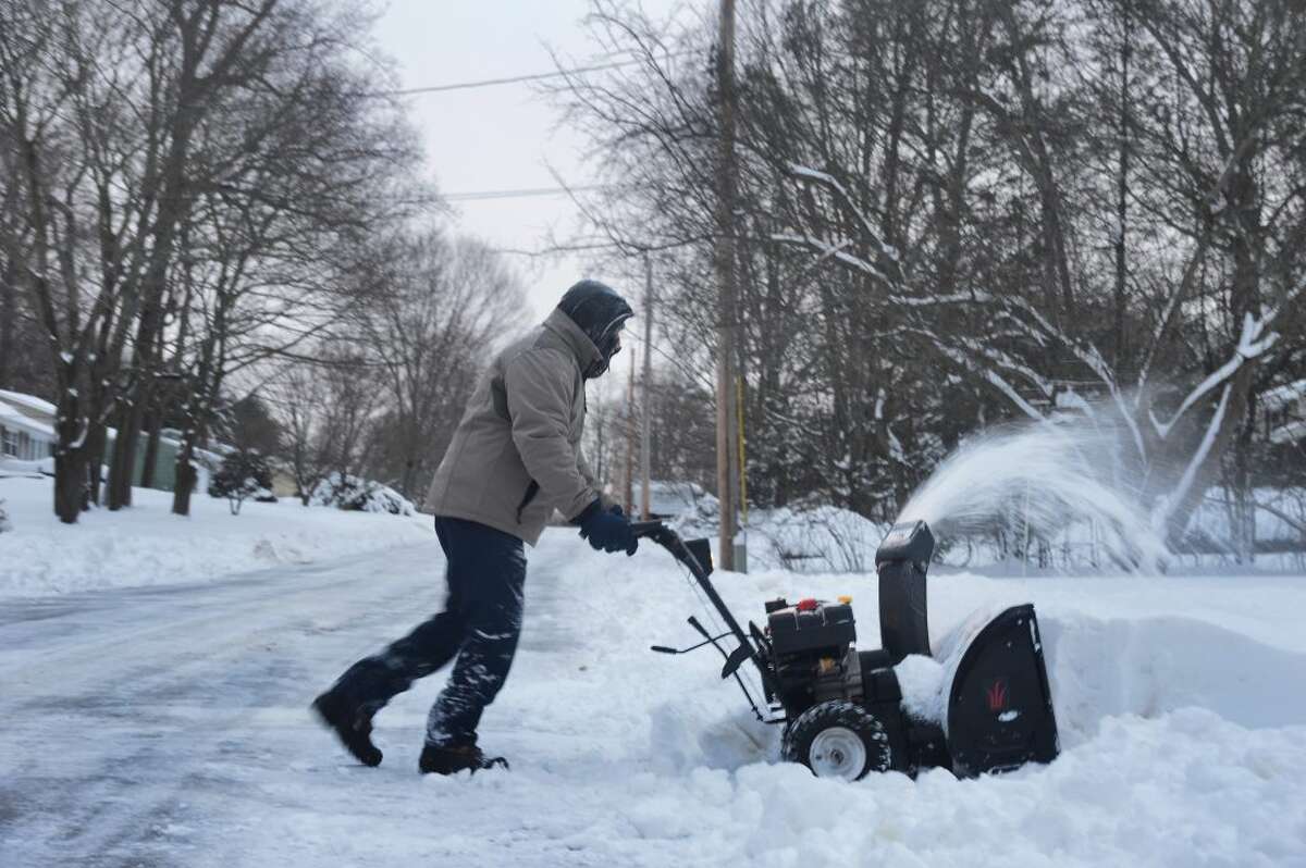 Cleaning up after storm Trumbull CT