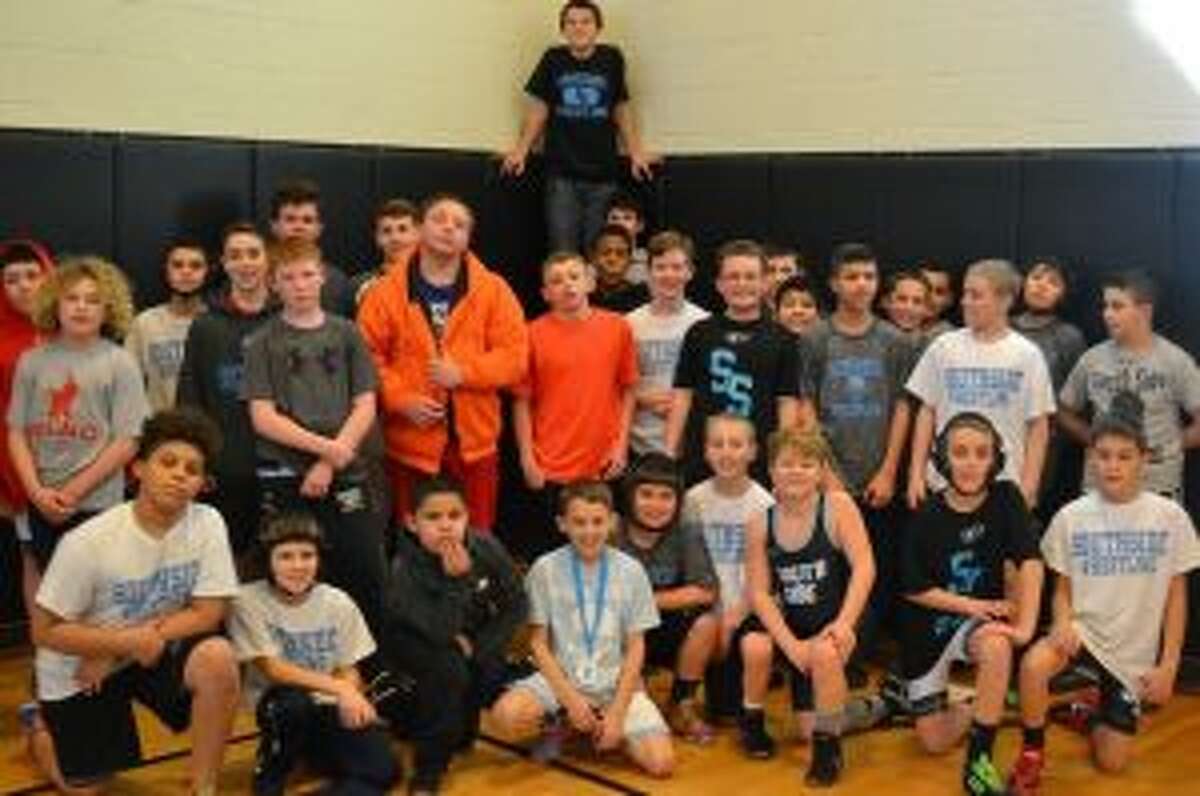South Side brought home 10 titles from its Scuffle Wrestling Tournament.