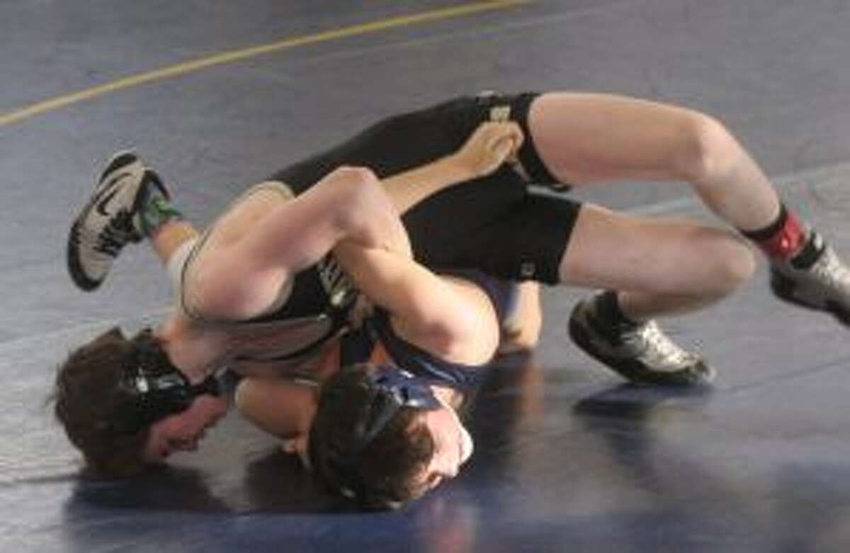 Jack Ryan won by injury default in his 126-pound bout to give Trumbull an early lead. — File photo