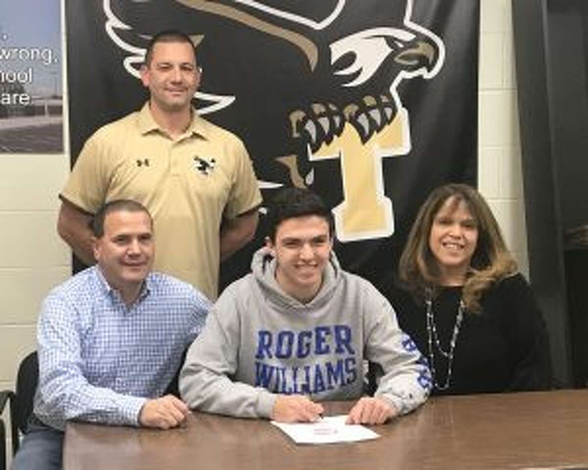 Flanking Ryan Gomes are mom Cindy and dad David, along with THS head baseball coach Phil Pacelli.