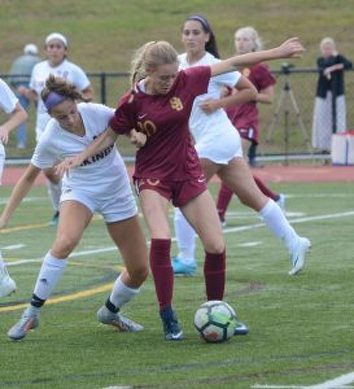 Maddie Fried (center) gave the Cadets the lead in their win over the Senators.