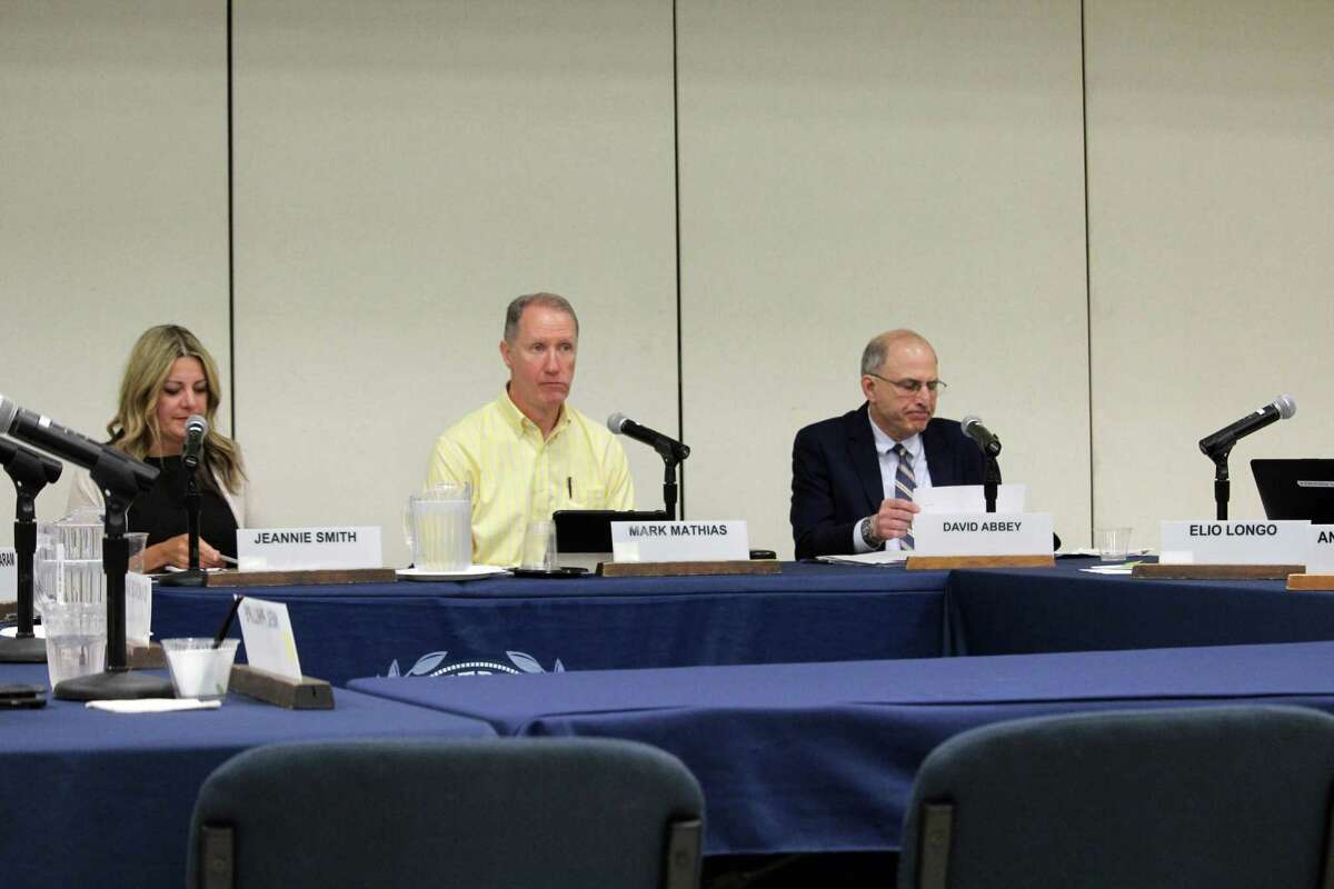 Board of Education Vice Chair Jeannie Smith, Board of Education Chairman Mark Mathias and Interim Superintendent of Schools David Abbey at the Board of Education meeting Monday night. Taken June 3, 2019 in Westport.