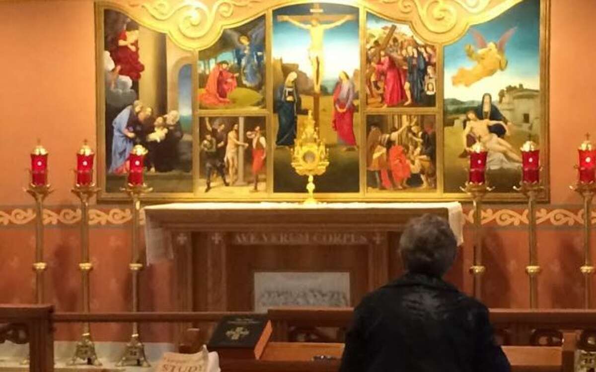 Volunteers at St. Theresa have maintained a continuous vigil in the church's new chapel for a full year, with no plans to end it. - Donald Eng photo