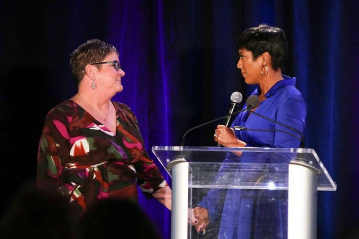 Tamron Hall (right) and Survivor Speaker Lori Bennett at Tuesday's Speaking of Women Luncheon. — Photo by Stan Godlewski.