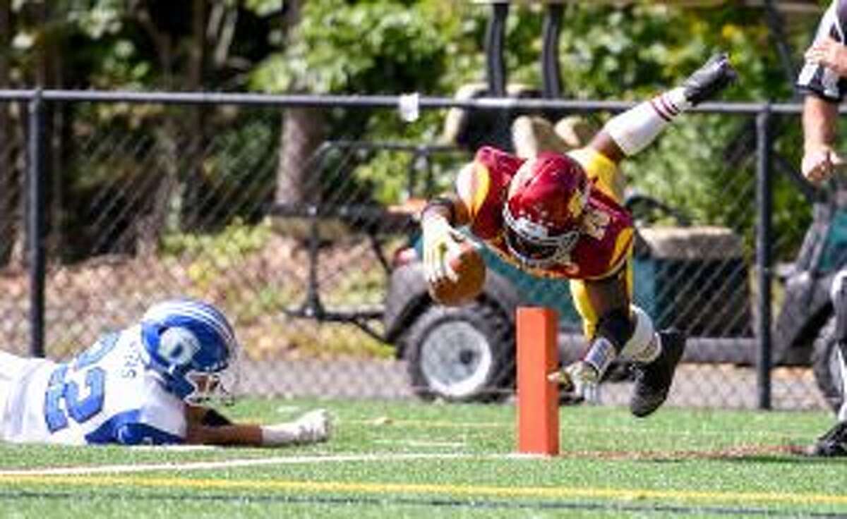 Jaden Shirden reaches back to make sure the football hits the pylon when the junior went 27 yards for a touchdown. — David G. Whitham photo