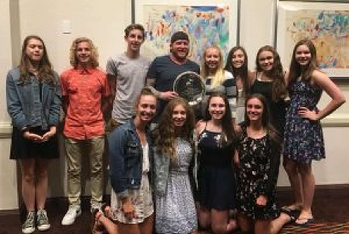 Trumbull Pisces feted (front row) are: Julia Nevins, Jackie Dale, Erin Racicot and Blake Asaro; (second row) Liz Stoelzel, Cameron Kosak, Liam Crecca, coach Bill Strickland, coach Colleen Carroll, Norah Hampford, Anna Haydostian and Grace Carravone.