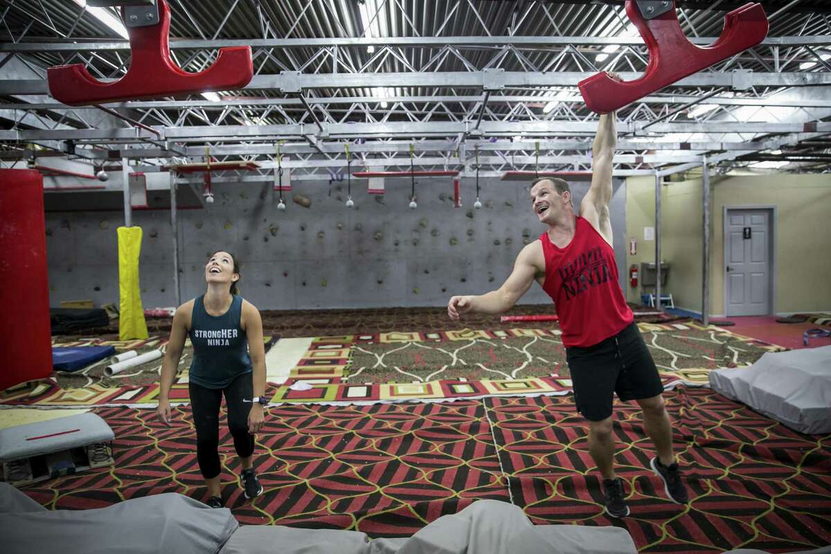 Lauren and Mike Murray play on ‘American Ninja Warrior’ wingtips at Iron Sports Gym.