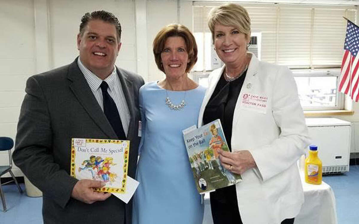 State Rep. David Rutigliano with Jane Ryan Elementary School Principal Mary Ellen Bolton and State Rep. Laura Devlin.