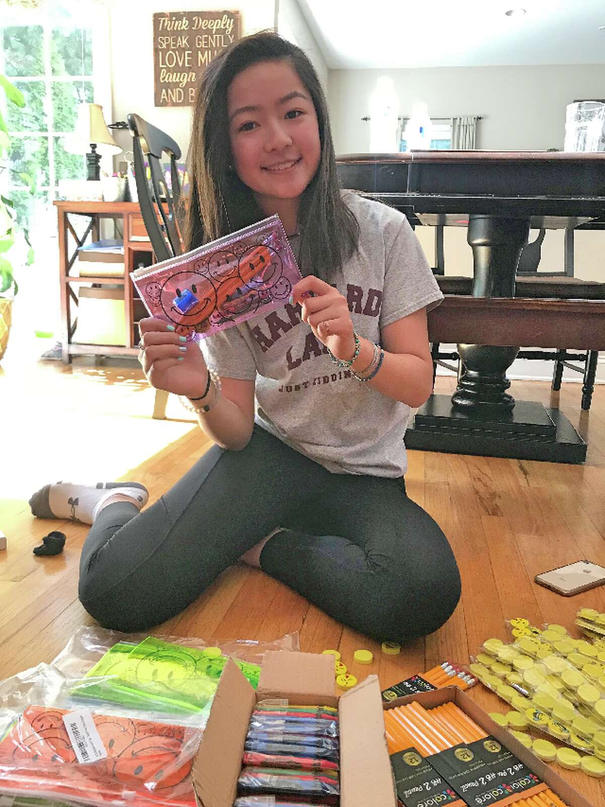 Trumbull High freshman Emily Kong hopes to send hundreds of school supply pouches to poverty-stricken children in Cambodia.