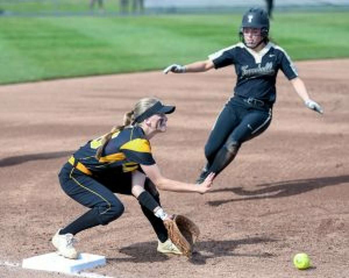 Courtney Fairfield, who hit a grand slam home run for the Eagles, is out at third on a force play in the second inning. - David G. Whitham photo