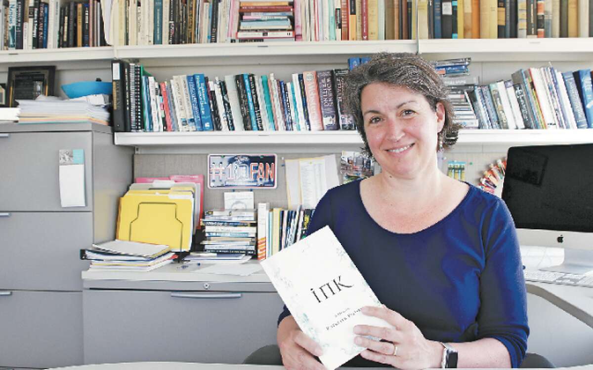 St. Catherine and St. Joseph graduate Kathleen Pfeiffer's memoir has recently won a national award.