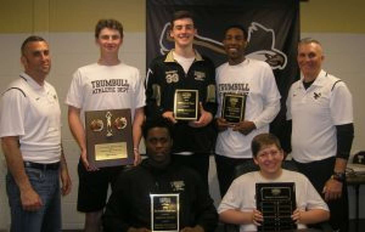 The Trumbull High boys basketball team honored some of its best players. Pictured (front row) are Quentar Taylor and Kyle Brennan; (second row) assistant varsity coach Matt Landin, Chris Brown, J.P. Fromageot and head coach Buddy Bray.