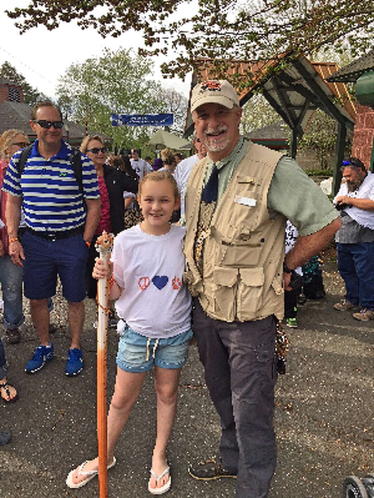 Trumbull student Samantha Petiprin, 10, and Zoo Director Gregg Dancho at Saturday’s Tiger Trot.