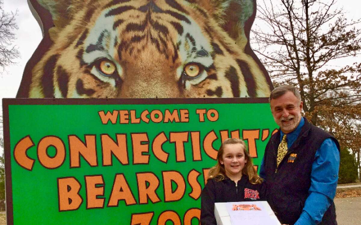 Samantha Petiprin with Zoo Director Greg Dancho.