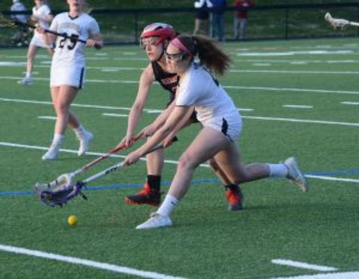 Emma Butler works for possession against Cheshire. - Andy Hutchison photo